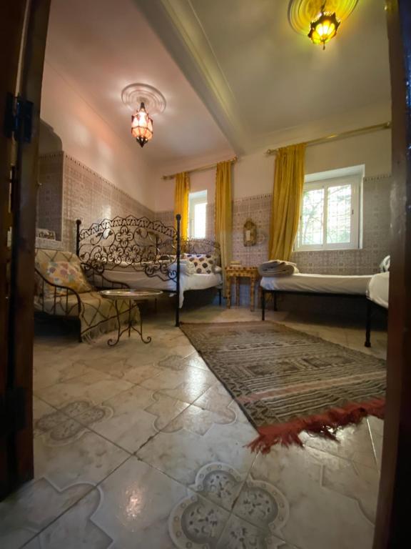 Postel nebo postele na pokoji v ubytování Fes Hostel Home