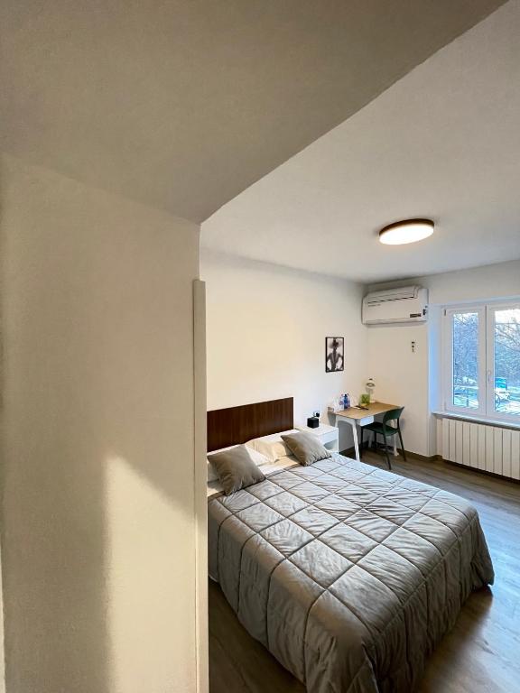 Łóżko lub łóżka w pokoju w obiekcie Smart Silver Apartment Central