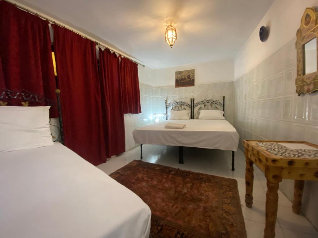 Postel nebo postele na pokoji v ubytování Fes Hostel Home