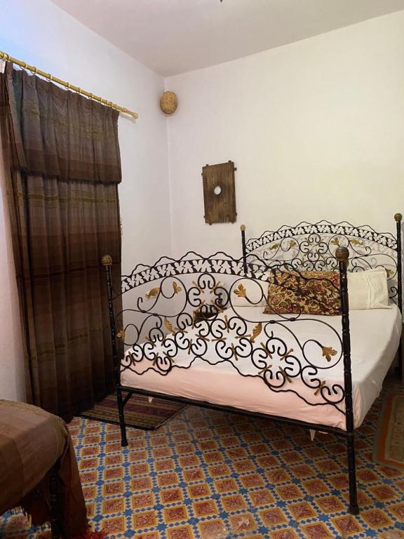 Postel nebo postele na pokoji v ubytování Fes Hostel Home