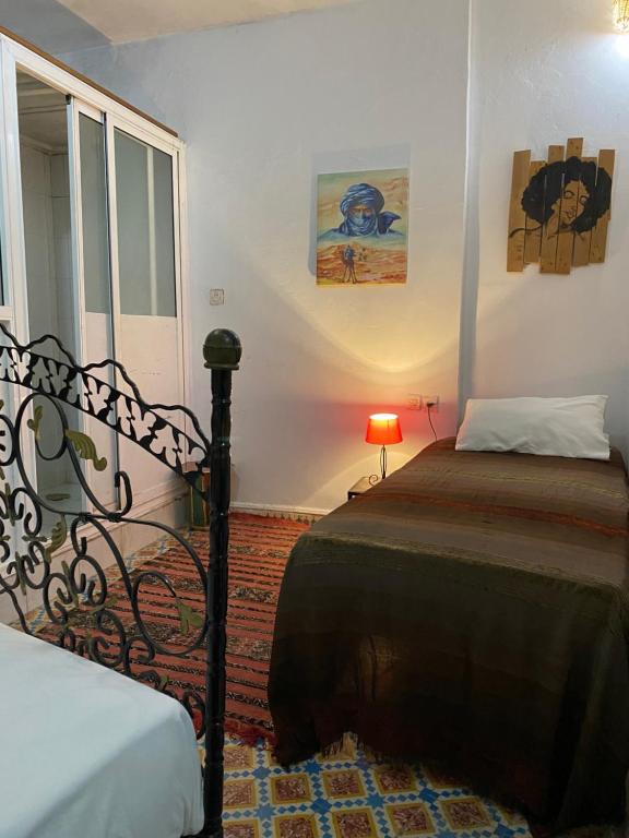 Postel nebo postele na pokoji v ubytování Fes Hostel Home