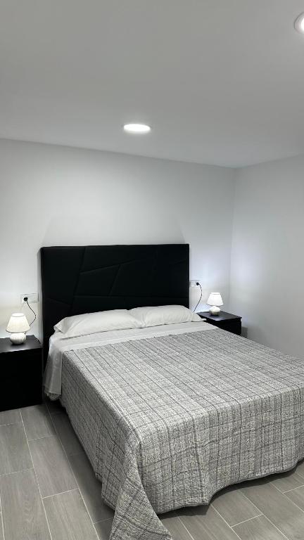 Posteľ alebo postele v izbe v ubytovaní Apartamento FELICIA