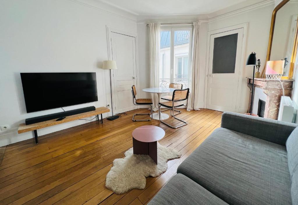 Fotografia z galérie ubytovania Charmant appartement entre Montmartre et canal Saint Martin-gare du nord v Paríži