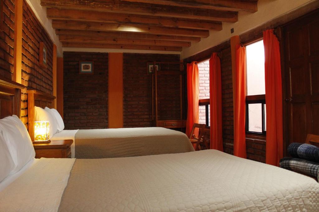Postel nebo postele na pokoji v ubytování Casa Diez-59 Guanajuato Capital