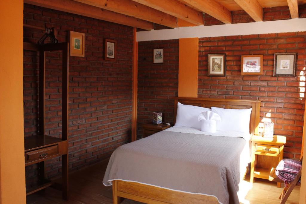 Postel nebo postele na pokoji v ubytování Casa Diez-59 Guanajuato Capital