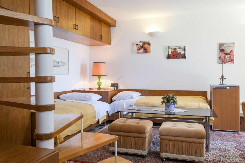 Postel nebo postele na pokoji v ubytování Holiday Home Luma