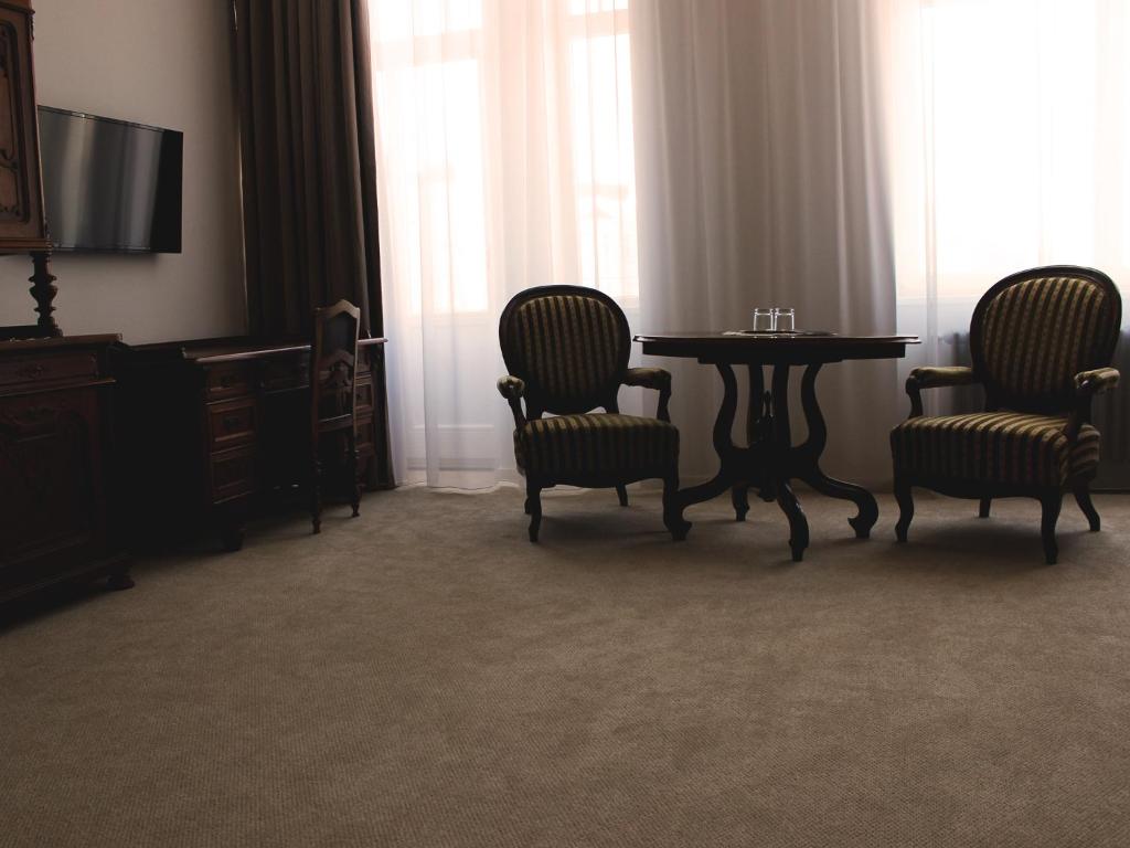 TV a/nebo společenská místnost v ubytování Hotel Lev