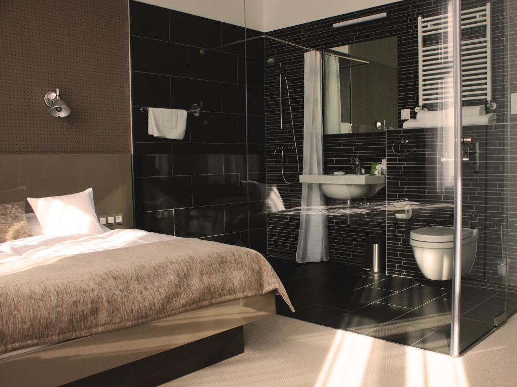 Koupelna v ubytování Hotel Lev