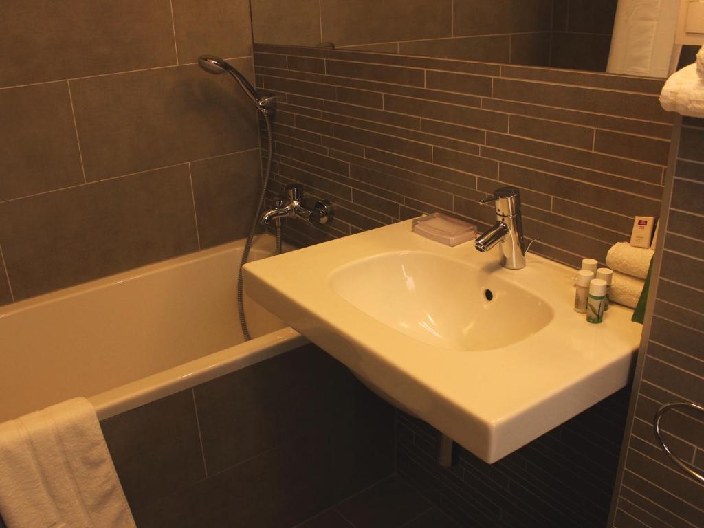 Koupelna v ubytování Hotel Lev