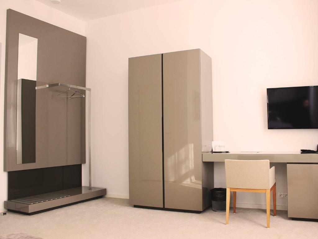 TV a/nebo společenská místnost v ubytování Hotel Lev