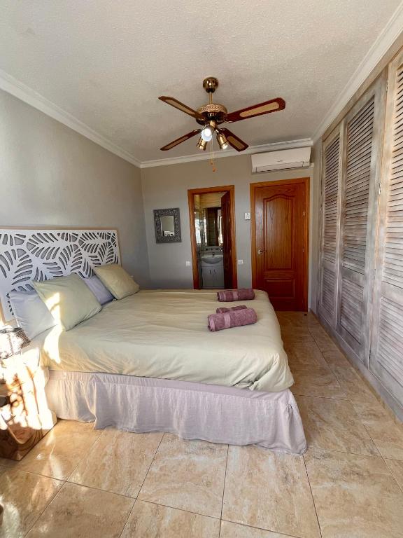 Posteľ alebo postele v izbe v ubytovaní Beach house 'Tiempo Lento'