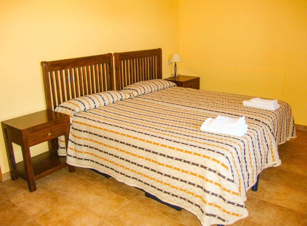 Postel nebo postele na pokoji v ubytování Apartamentos Fandin
