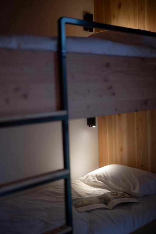 Postel nebo postele na pokoji v ubytování L'Orée des Sources
