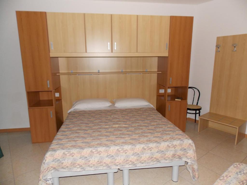 Postel nebo postele na pokoji v ubytování Hotel Colorado