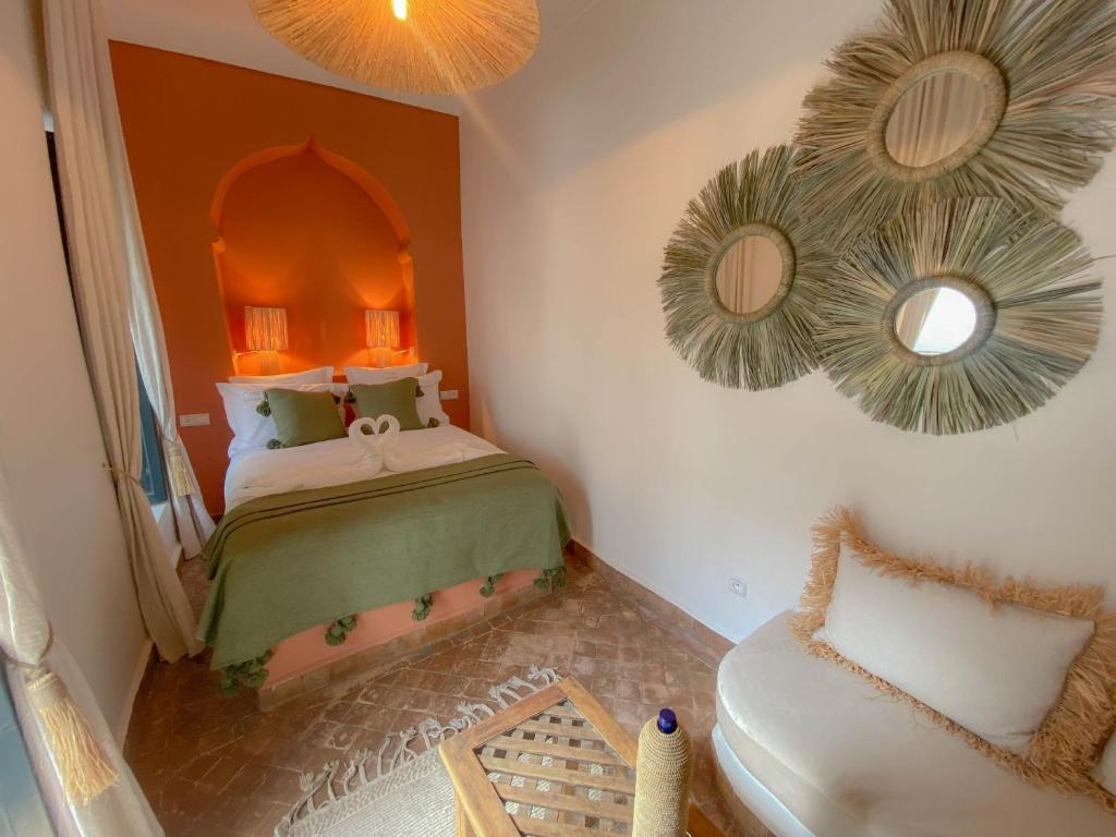 Postel nebo postele na pokoji v ubytování Riad Dar Marrakcha
