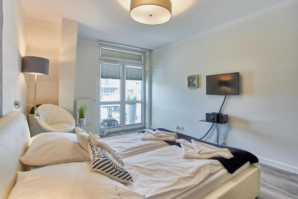 Posteľ alebo postele v izbe v ubytovaní Villa Mistral by Baltic Home