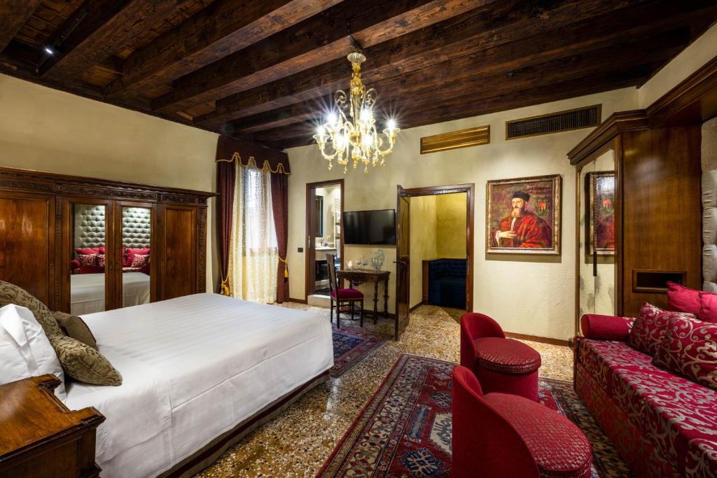 Postel nebo postele na pokoji v ubytování Hotel Palazzo Priuli