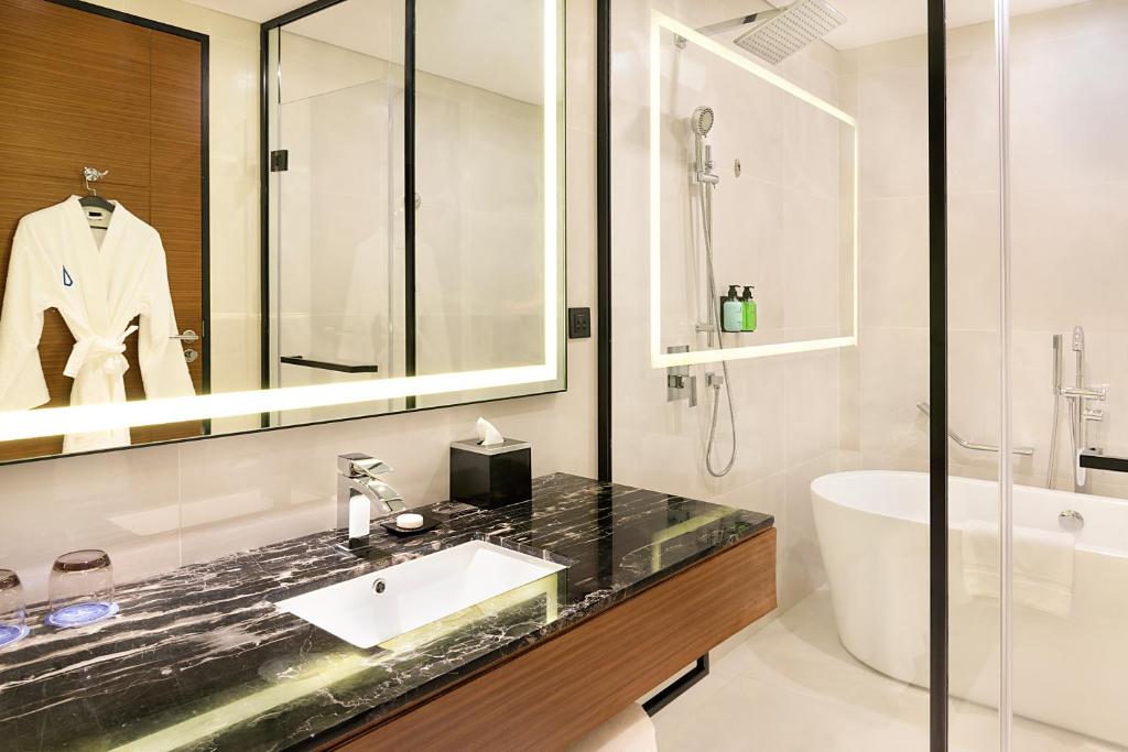 Koupelna v ubytování Asiana Grand Hotel
