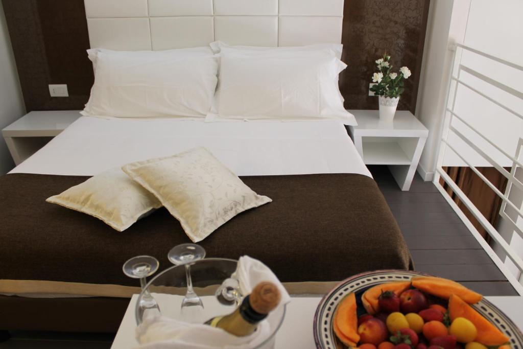 Postel nebo postele na pokoji v ubytování Hotel La Torraccia
