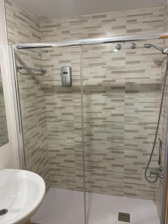 Kúpeľňa v ubytovaní HOSTAL CID