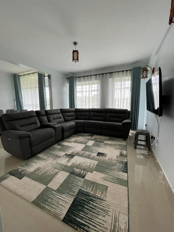 Posezení v ubytování Zoe Homes 1br and 2br Apartment Greypoint 406