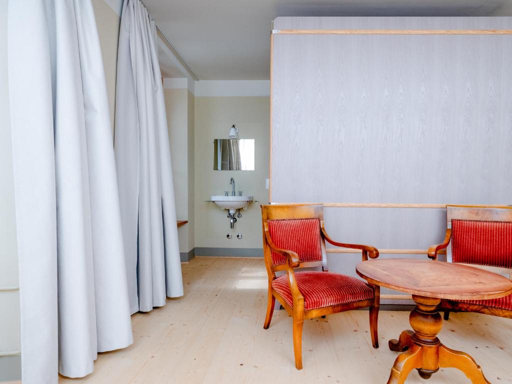 Istumisnurk majutusasutuses Grand Hotel du Cervin - Auberge de jeunesse et spa