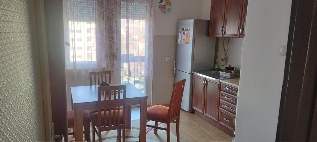 Kuchyň nebo kuchyňský kout v ubytování Apartman LENA