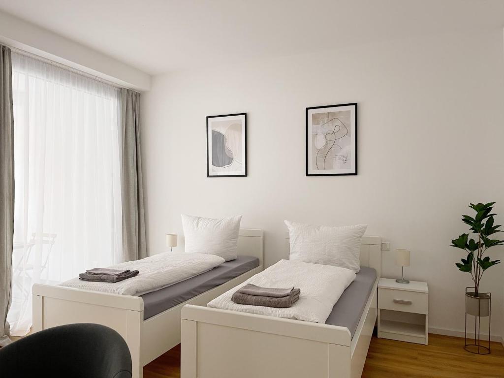 Moderne Apartments im Herzen der Stadt I private Tiefgarage mit Ladesäulen I home2share - Two-Room Apartment