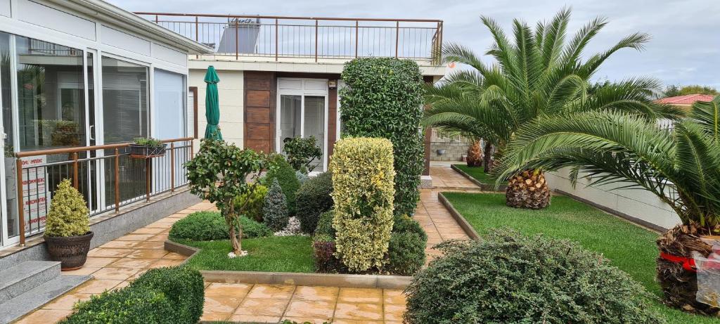 A garden outside Villa Avdira
