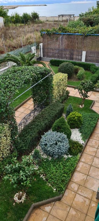 A garden outside Villa Avdira