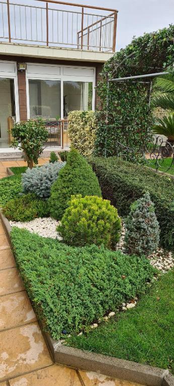 A garden outside Villa Avdira