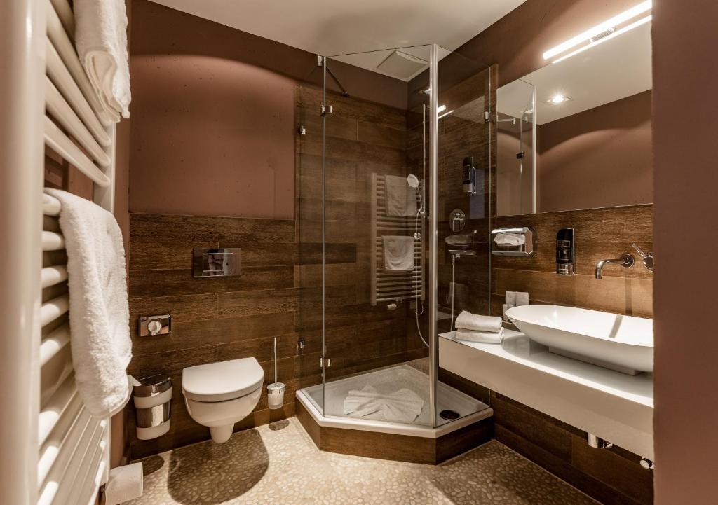 Koupelna v ubytování Hotel Villa Lago Garni