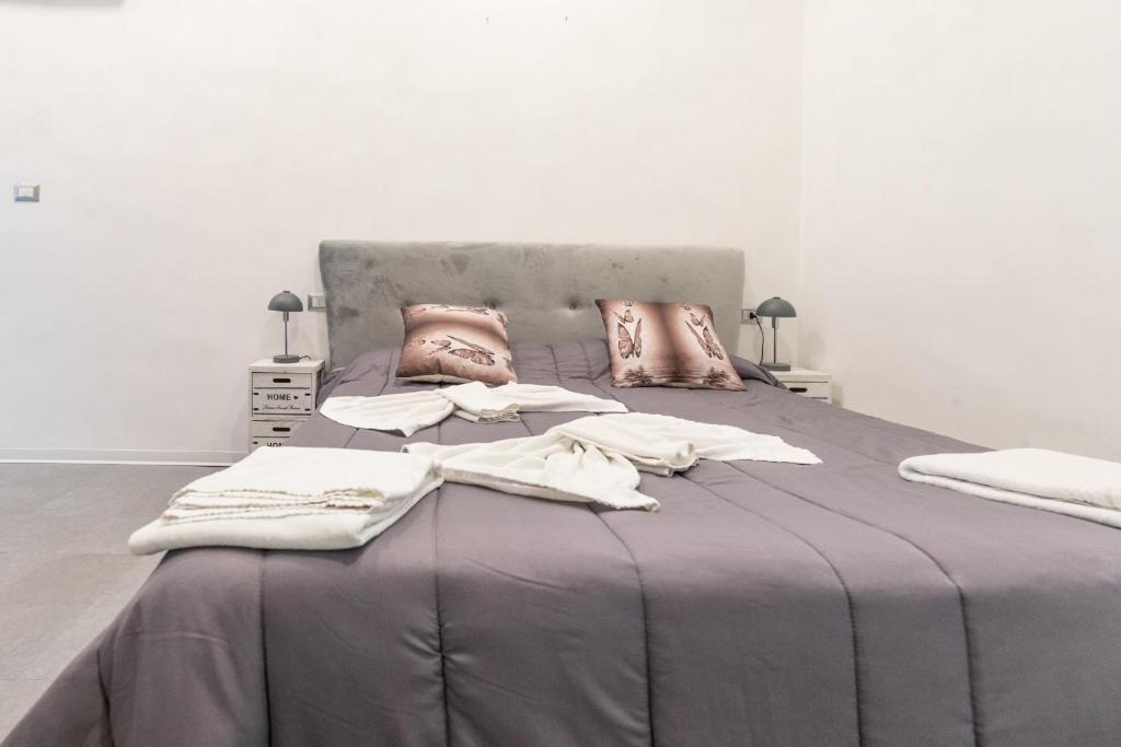 Posteľ alebo postele v izbe v ubytovaní MADB&B