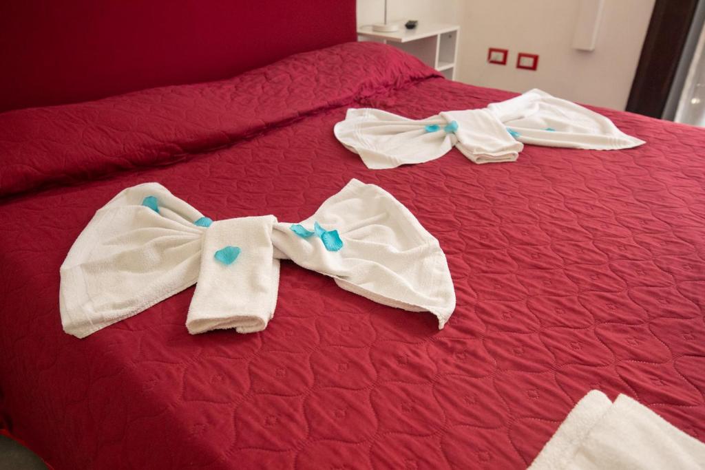 Posteľ alebo postele v izbe v ubytovaní MADB&B