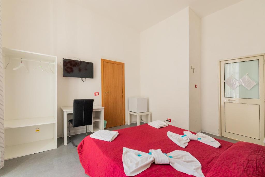 Televízia a/alebo spoločenská miestnosť v ubytovaní MADB&B
