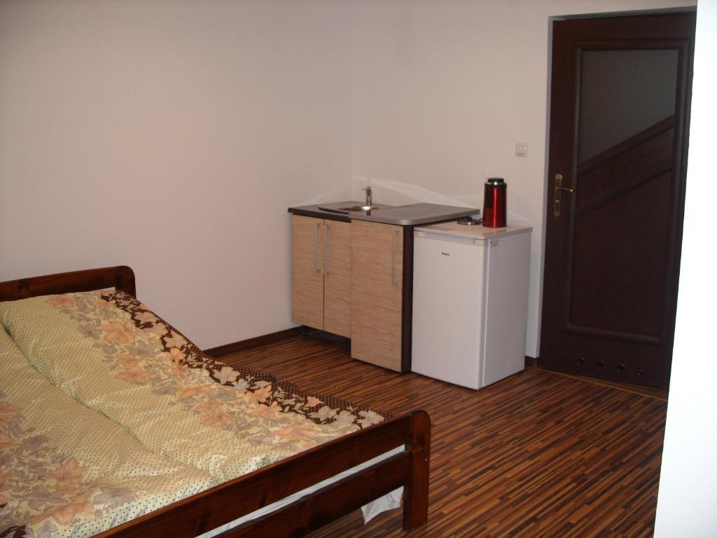 Postel nebo postele na pokoji v ubytování Pokoje Typu Studio Sosnowiec