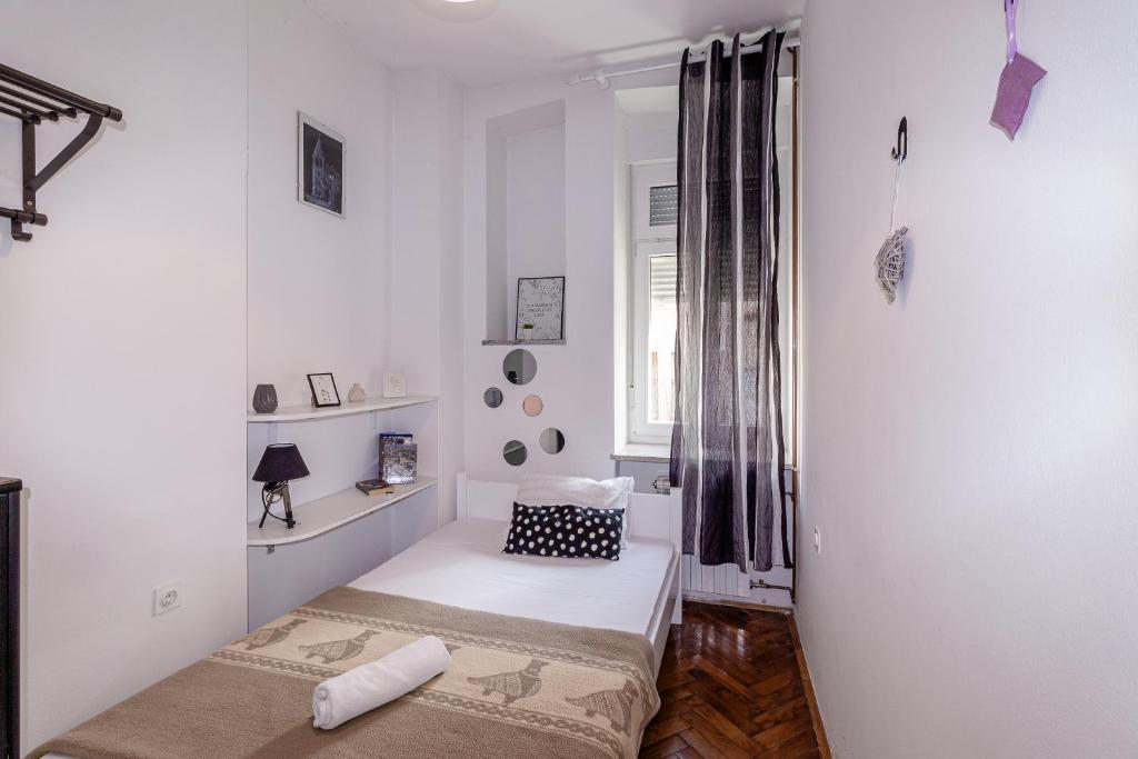 Postel nebo postele na pokoji v ubytování Apartment G37