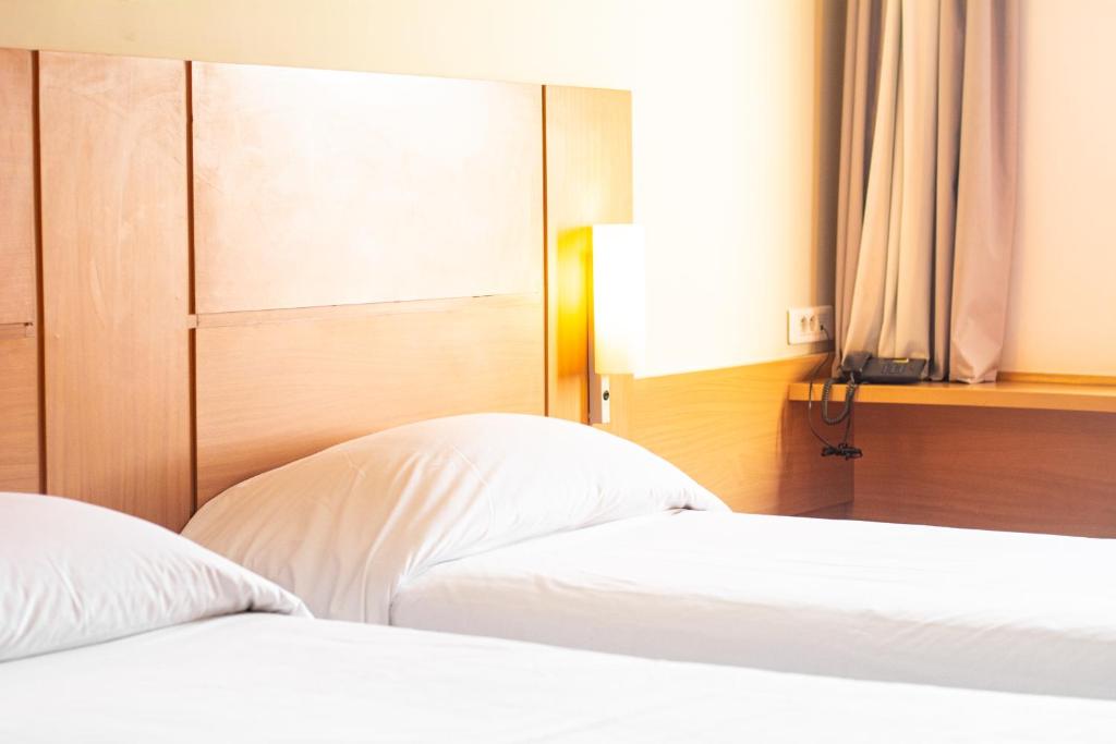 Postel nebo postele na pokoji v ubytování Ibis Meknes