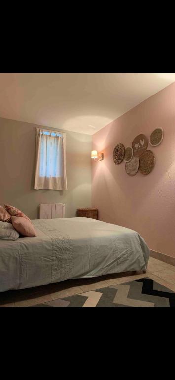 Posteľ alebo postele v izbe v ubytovaní Le Kerioubet - B&B au cœur du Pays d’Auge