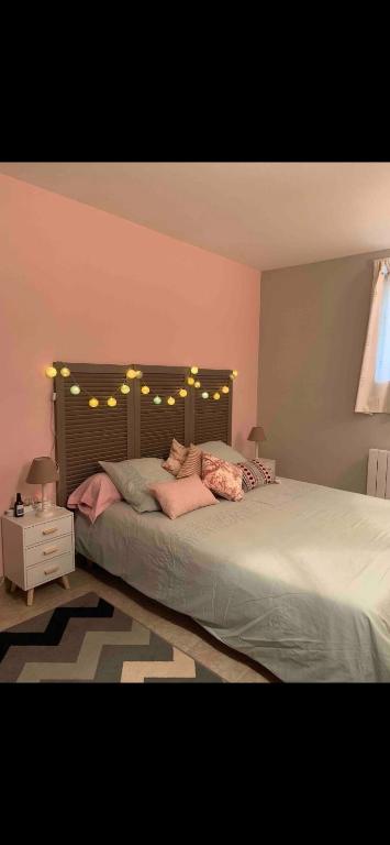 Posteľ alebo postele v izbe v ubytovaní Le Kerioubet - B&B au cœur du Pays d’Auge