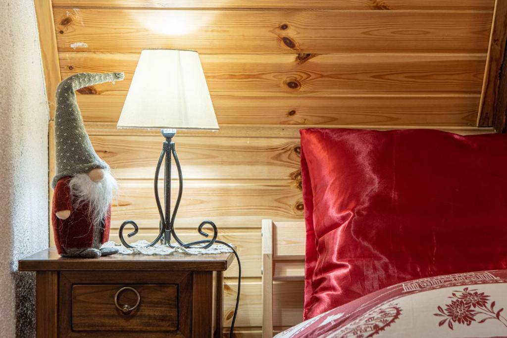 Posteľ alebo postele v izbe v ubytovaní CASA VACANZA "AI PIEDI DEL BOSCO"