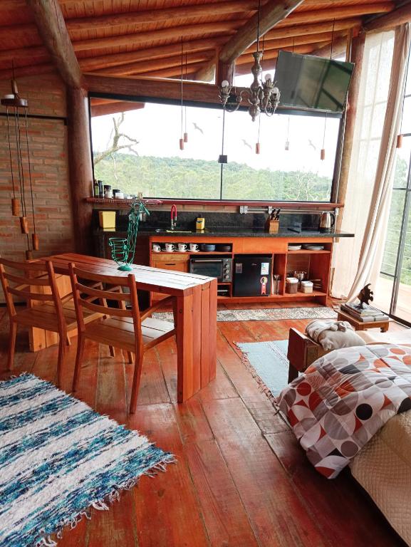 Tiny Houses O Olival - aluguel temporadaにあるシーティングエリア
