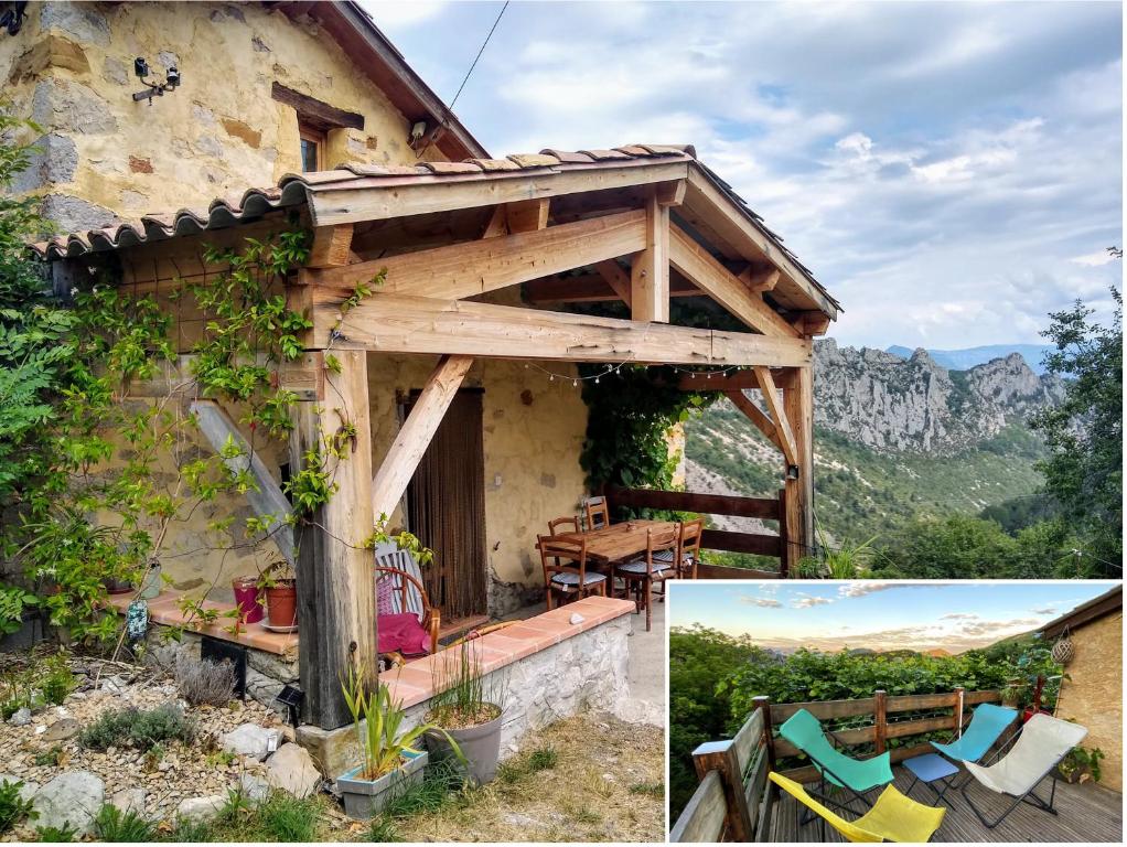 a picture of a house with a table and chairs at Gîte de la Chabespa, belle vue, au calme in Sigottier