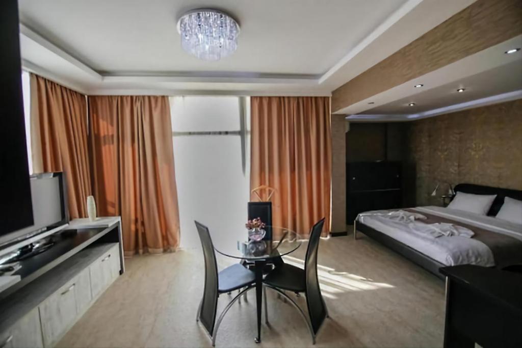Postel nebo postele na pokoji v ubytování Panorama 360° Hotel