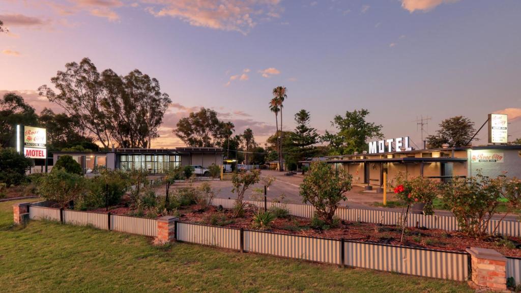 a view of a parking lot with a building at Rose City Motor Inn in Benalla