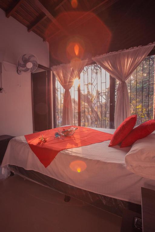Postel nebo postele na pokoji v ubytování Hotel Palma De Sevilla