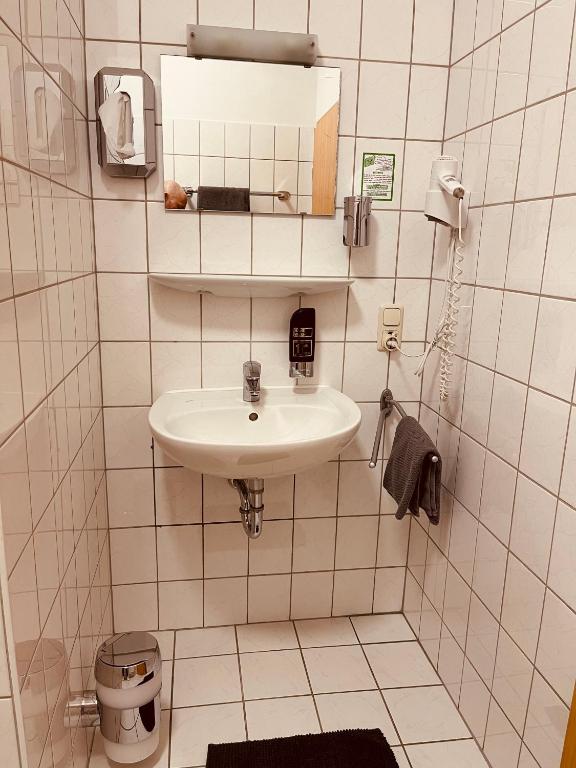 Koupelna v ubytování Gasthof Hotel Bräustübl