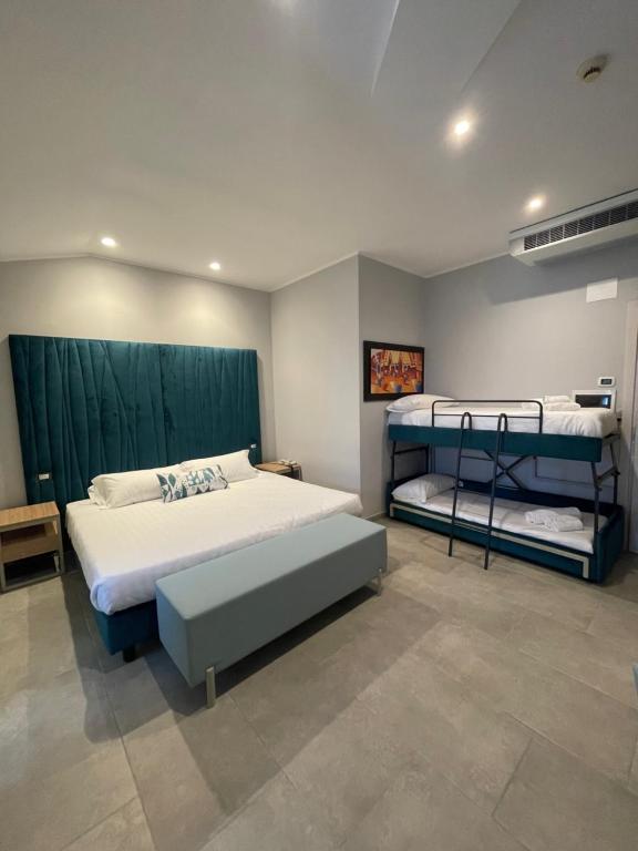 Postel nebo postele na pokoji v ubytování Hotel Sant'Elia