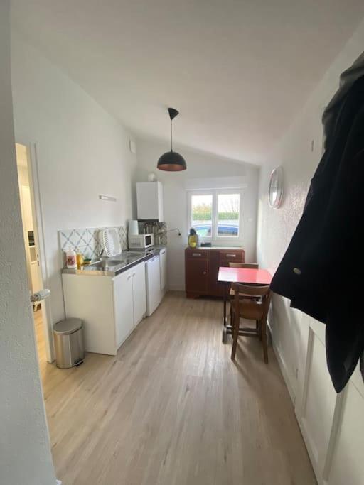 Kuchyňa alebo kuchynka v ubytovaní Studio n3 avec place de parking gratuite