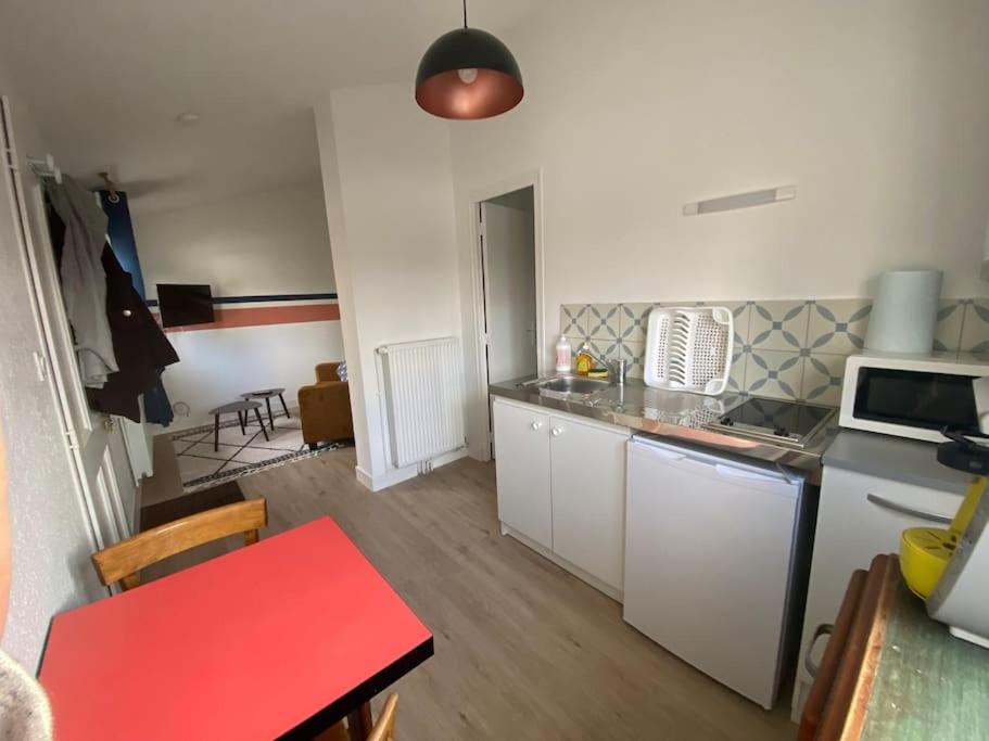 Kuchyňa alebo kuchynka v ubytovaní Studio n3 avec place de parking gratuite